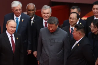 Xi Jinping walks between Vladimir Putin and Kim Jong Un at China's Victory Day parade event in Beijing, 3 September 2025