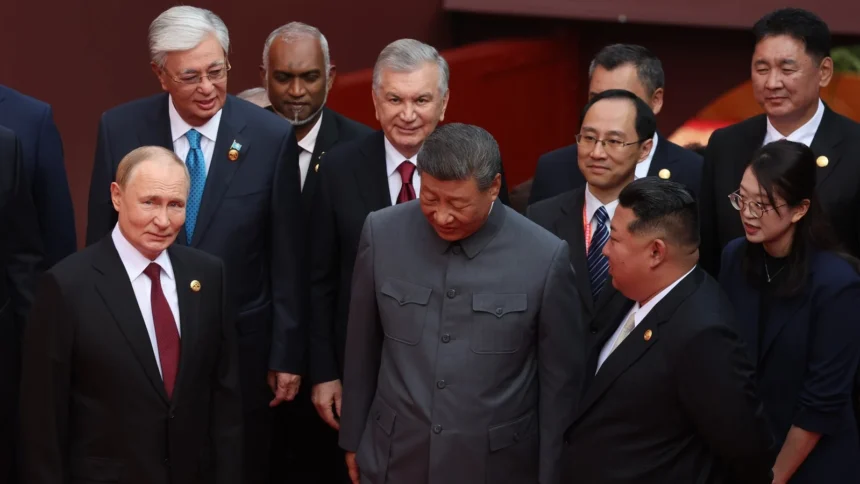 Xi Jinping walks between Vladimir Putin and Kim Jong Un at China's Victory Day parade event in Beijing, 3 September 2025