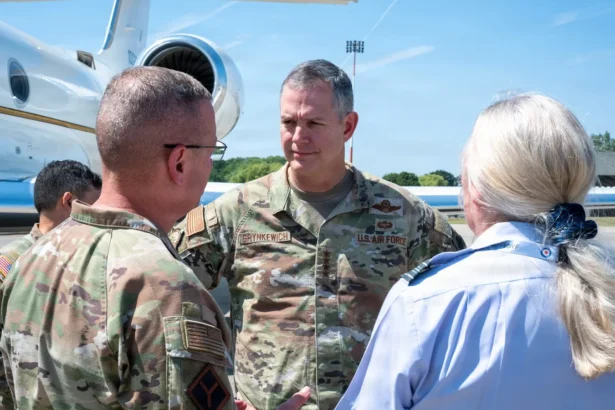 NATO Supreme Allied Commander Europe Gen. Alexus Grynkewich speaks with US and RAF officers at RAF Fairford