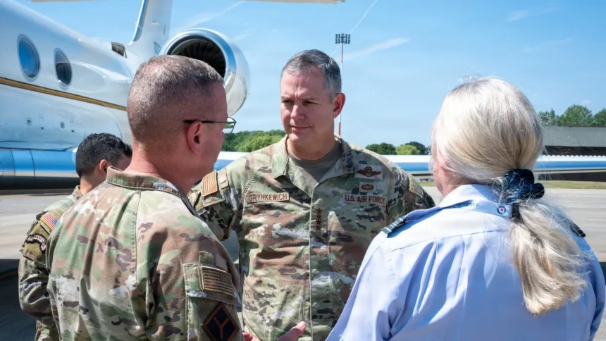 NATO Supreme Allied Commander Europe Gen. Alexus Grynkewich speaks with US and RAF officers at RAF Fairford