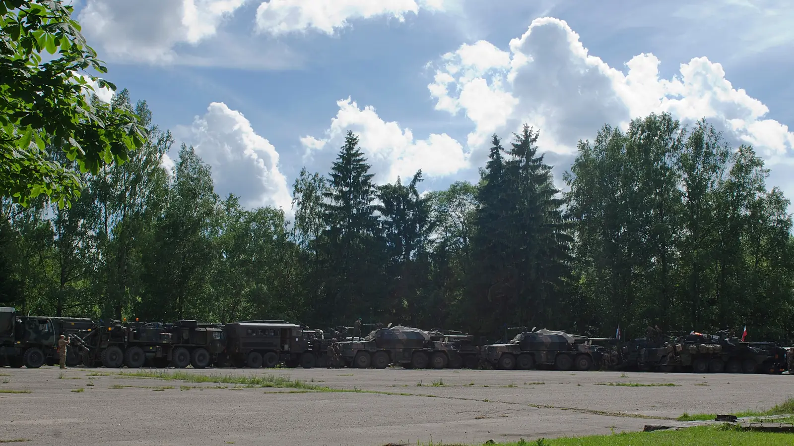 Line of NATO Battle Group Poland vehicles after a Suwalki Gap movement into Lithuania