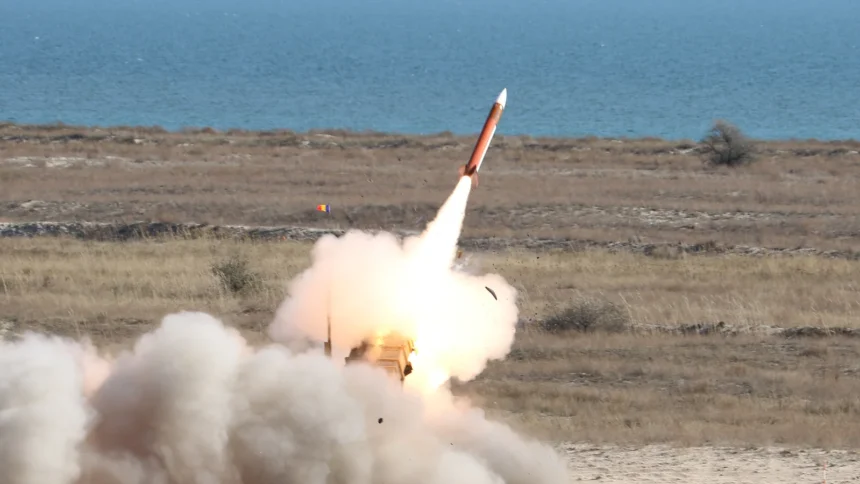 Romanian Patriot interceptor leaving its launcher in a cloud of smoke on the Black Sea coast